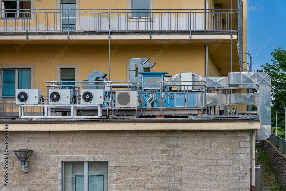 Air conditioning units (HVAC) with compressors installed outside the building
