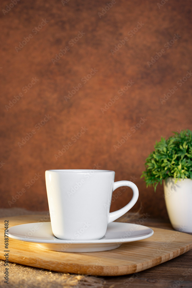 Black coffee cup on an old wooden table side view Black coffee cup on an old wooden table side view