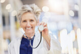 Portrait, health and stethoscope with an old woman doctor in the hospital for cardiology or treatment. Medical, heart care and wellness with a senior female medicine professional in a clinic