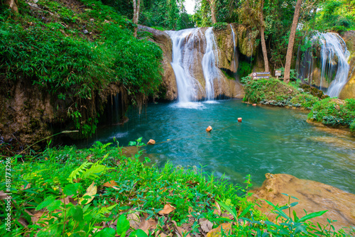 Waterfall in tropical rainforest with green tree forest in Phayao north of Thailand