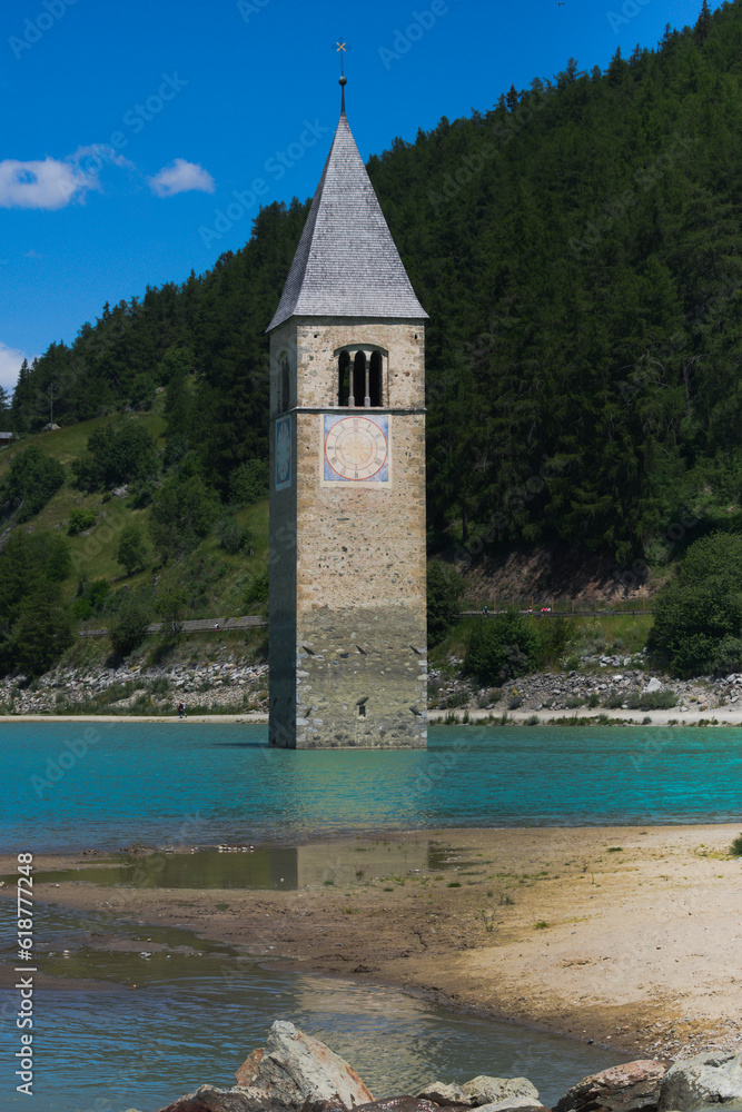 The famous famous flooded belfry of Curon Venosta (german: Graun im Vinschgau). Lake Reschen,  Southern Tyrol, Italy