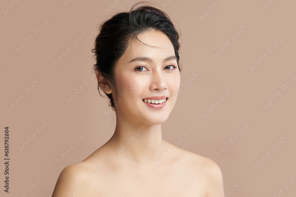 Beautiful young asian woman with clean fresh skin on beige background, Face care, Facial treatment, Cosmetology, beauty and spa, Asian women portrait. Beautiful young asian woman with clean fresh skin on beige background, Face care, Facial treatment, Cosmetology, beauty and spa, Asian women portrait.