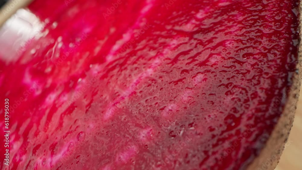 A macro video showcases the vibrant, intricate details of a half beetroot, revealing its rich hues, fibrous textures, and stunning organic patterns. The probe lens explores every nook and cranny
A macro video showcases the vibrant, intricate details of a half beetroot, revealing its rich hues, fibrous textures, and stunning organic patterns. The probe lens explores every nook and cranny