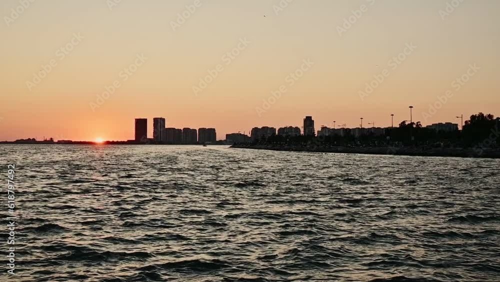 sunset and city view at sea sunset and city view at sea