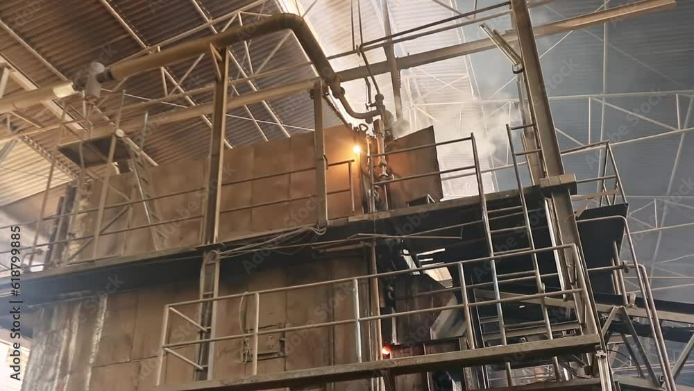 Industrial oven or furnace inside the factory for manufacturing processes Industrial oven or furnace inside the factory for manufacturing processes