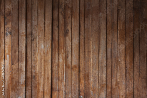 Grunge wood panel vertical with empty space for background.