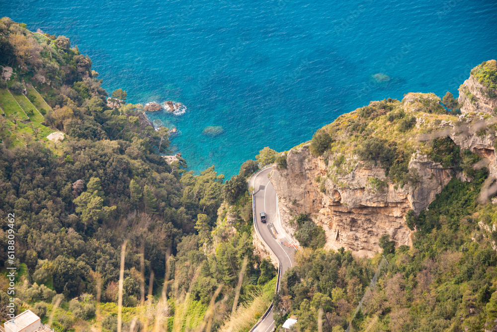 Scenic road along beautiful turquoise sea in Italy