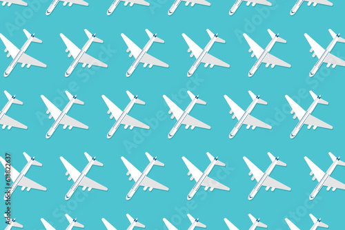 Creative composition made with passenger plane on pastel blue background. Summer travel or vacation pattern. Vector illustration