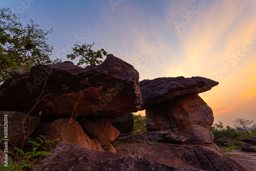 .scenery sunrise at weird shaped rock..These stones have been meticulously formed by nature to create a stunning visual masterpiece..The stones had been carved and shaped into incredible structures..