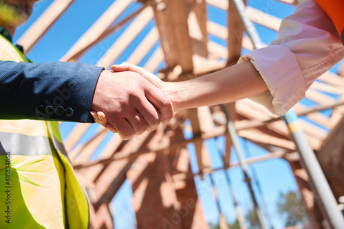 Bild auf Leinwand Contractor and building engineer shaking hands, close-up