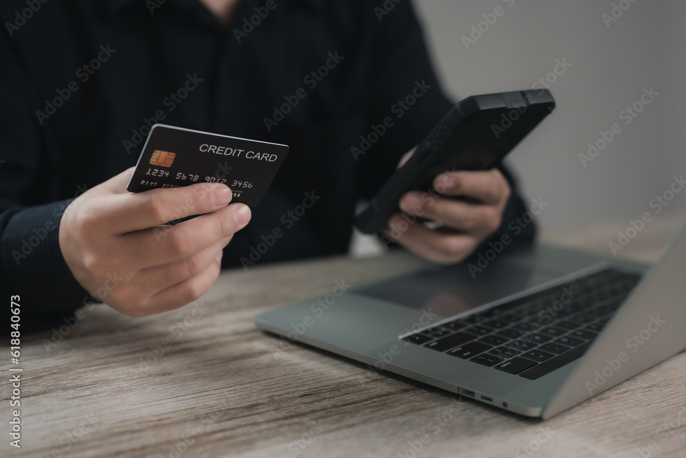 Concept e banking or e commerce : business man using his Laptop for payment by wallet app technology or digital money transfer after his shopping something by application . Concept e banking or e commerce : business man using his Laptop for payment by wallet app technology or digital money transfer after his shopping something by application .