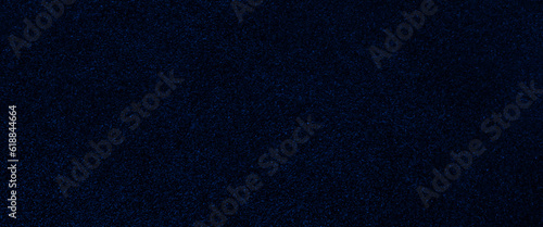Classic blue dark suede texture for background, concrete of a blue wall background, grunge blue textured background, empty copy space for text, grunge canvas and any design related works.