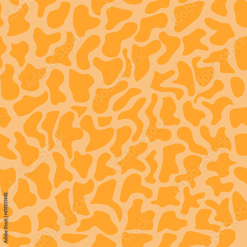 Seamless background in orange tones. Imitation giraffe skin.