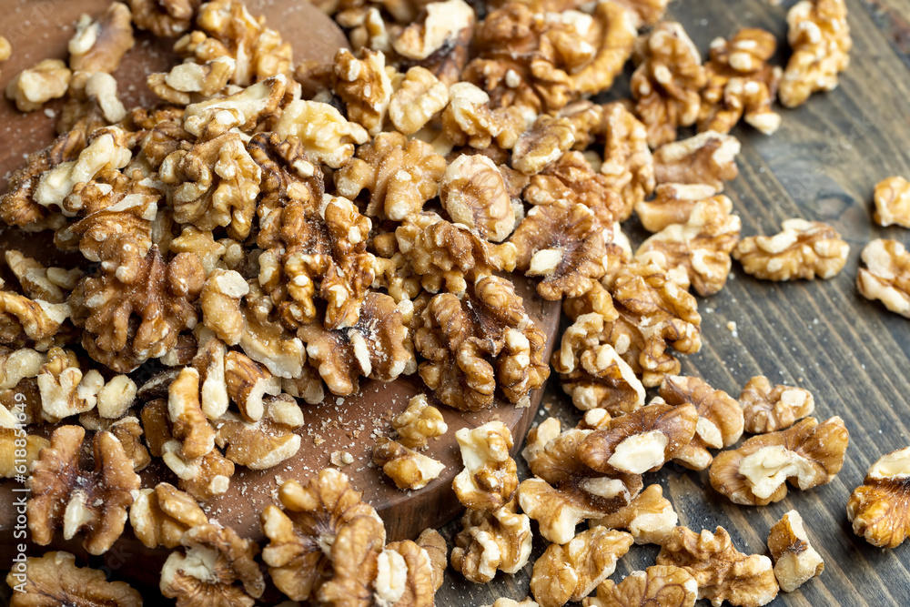 Walnut kernel on the kitchen table during cooking Walnut kernel on the kitchen table during cooking