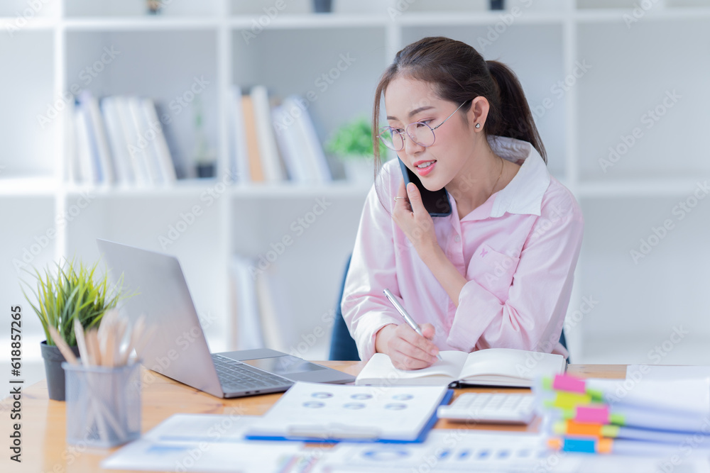 Young woman happy and screaming because of problems with documents in the office.