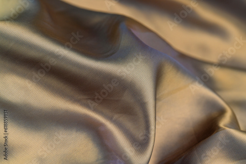 part of the fabric from beige-colored clothing