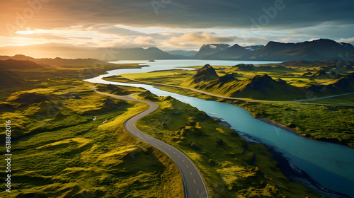 A scenic road curves through a lush valley, leading to a horizon of rolling hills and forests. Take a journey through this tranquil landscape, and discover the wonders that await.