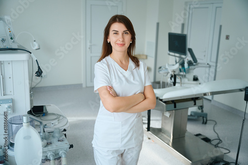 Female specialist standing in the hospital room