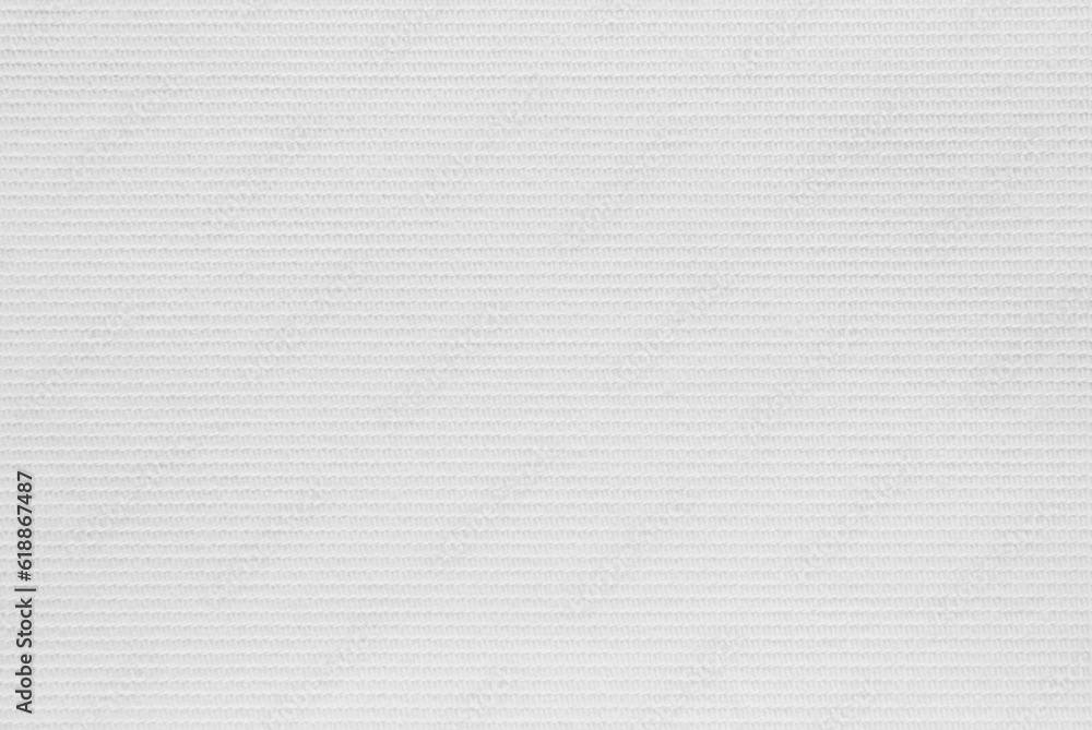 White cotton twill fabric pattern close up as background White cotton twill fabric pattern close up as background