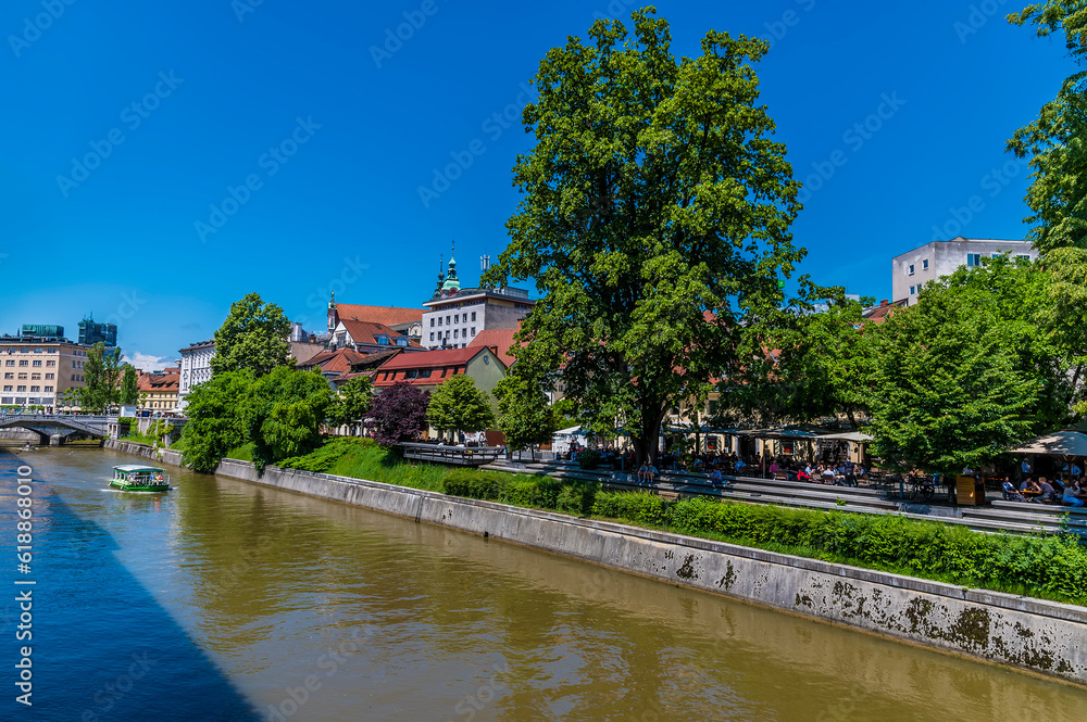 A view from the Butchers Bridge along the River Ljubljanica in Ljubljana, Slovenia in summertime