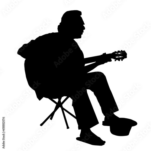 Silhouette of a guitarist on a white background. Vector illustration