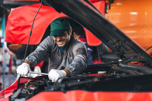 Professional automobile maintenance checking car damage broken part condition. Diagnostic and repairing vehicles at garage automotive, Car care check and fixed and services insurance concept. © Shutter B