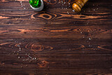 Wooden food background with spices, top view, copy space.