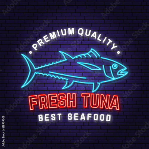 Best seafood. Fresh tuna neon sign. Vector illustration. For seafood emblem, sign, patch, shirt, menu restaurants, fish markets, stores. Neon sign, bright signboard, light banner.