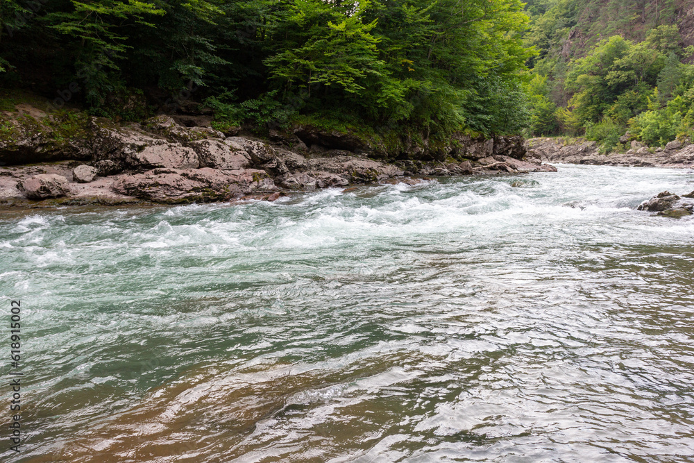 Fototapeta premium the beginning of autumn, nature walks, a mountain river and a panoramic view of the mountains, hiking trails and recreation in the mountains.*