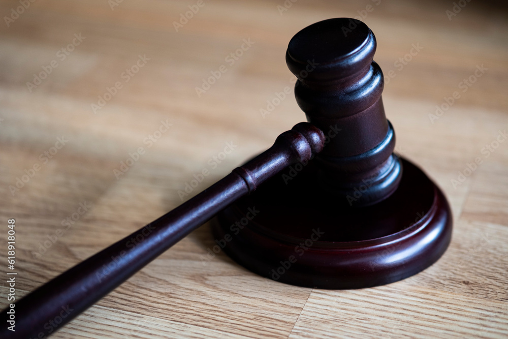 the judge's gavel on a stand to stand on the table. justice concept. the judge's gavel on a stand to stand on the table. justice concept.