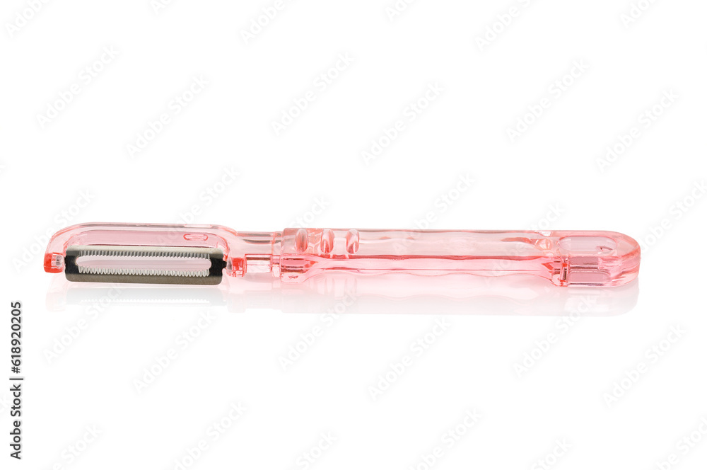 Vegetable peeler. Isolated on white background, close-up. Full depth of field. Vegetable peeler. Isolated on white background, close-up. Full depth of field.