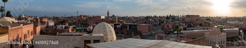 Panoramic view of the medina of Marrakech, the coupola of the Koubba Almoravid in the right side, seen from a rooftop photo