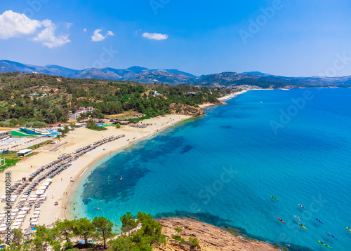 Beach and turquoise sea, umbrellas. Trypiti Beach, Thassos, Greece © oleg_p_100