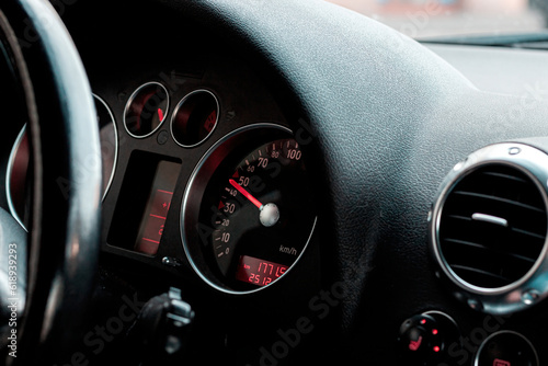 Vehicle odometer dashboard with red backlight and air cooling photo