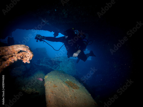 Wallpaper Mural Diver Inside the ship wreck of the SS Thistlegorm in the Red Sea, Egypt.  Underwater photography and travel. Torontodigital.ca