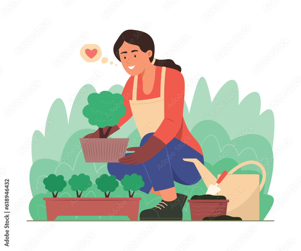 Woman Planting a Tree in Garden