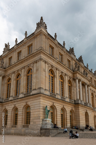 Paris, France - May 20, 2023: exterior, architecture and park outdoors of the Palace Versailles royal chateau UNESCO list of World Heritage Sites.