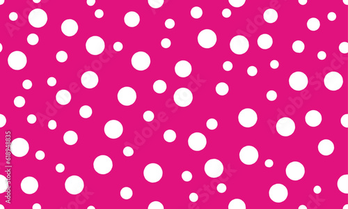 Abstract white random polka dot circles seamless pattern on pink background