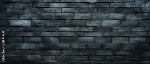 Texture of a black painted brick wall as a background or wallpaper