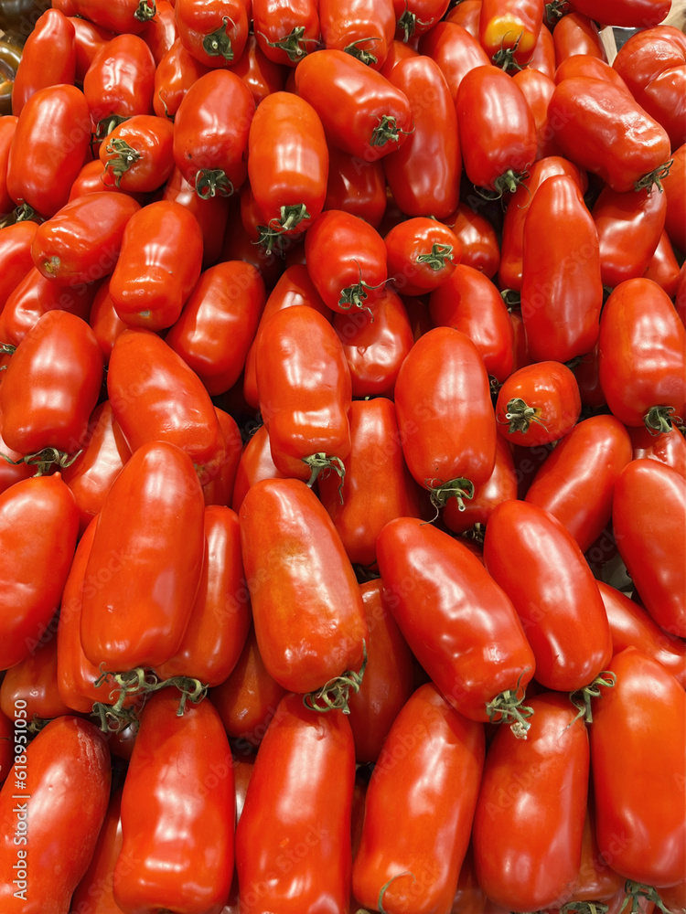 Abundance of Delicious Ripe Organic Tomatoes in the Store Abundance of Delicious Ripe Organic Tomatoes in the Store
