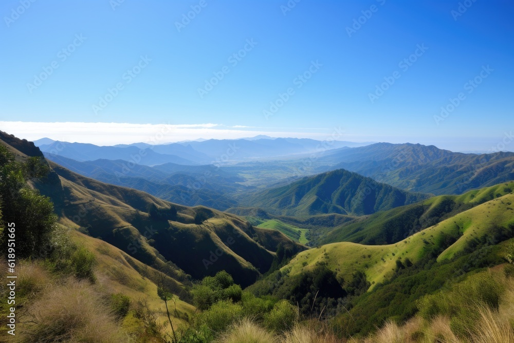 Fototapeta premium mountain range, with view of rolling hills and green valleys below, against blue sky, created with generative ai