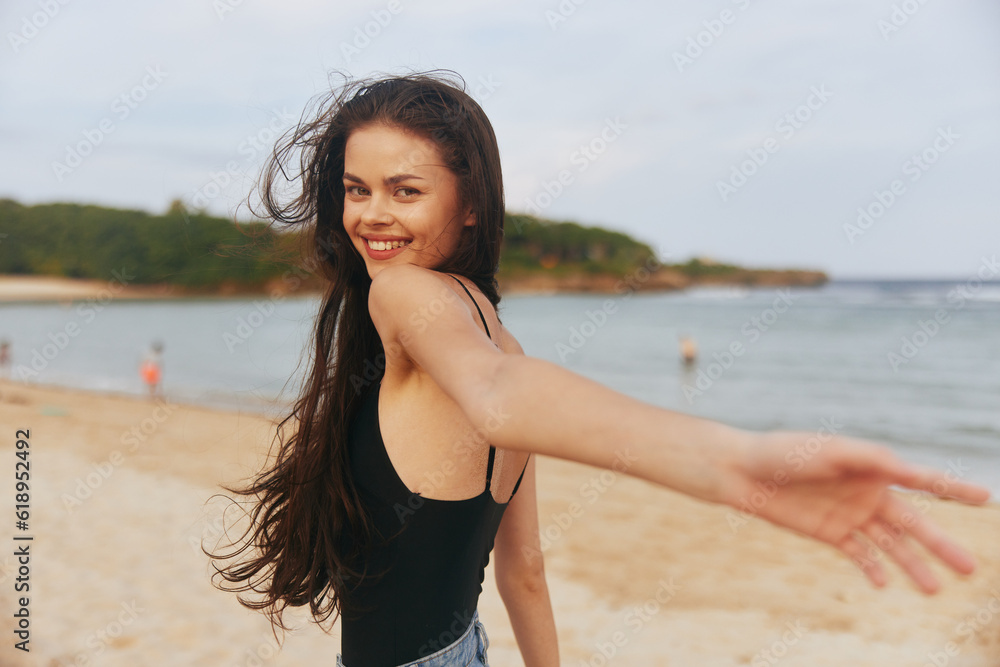 woman sand lifestyle sea ocean sunset shore beach summer vacation smile woman sand lifestyle sea ocean sunset shore beach summer vacation smile