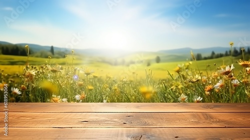 Fotografie, Obraz An illustration of spring-summer beautiful background with green, juicy young grass and an empty wooden table in the outdoor nature with blue sky and sun