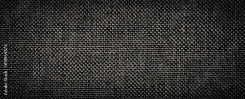 texture of black knitwear, natural fabric as a design element