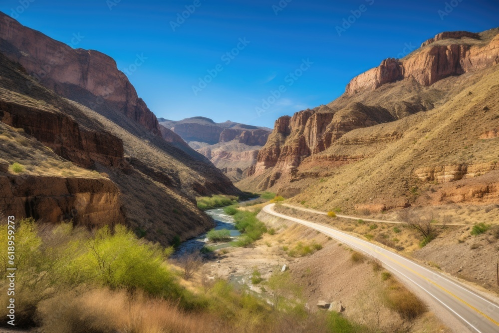 scenic road trip through a canyon, with towering cliffs and rushing waterfalls, created with generative ai