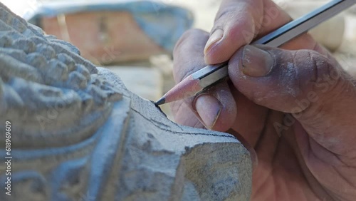 Stone Carvings in Odisha, India - Stone Carver work close up photo