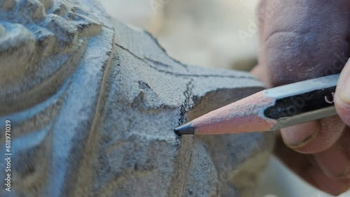 Stone Carvings in Odisha, India - Stone Carver work close up photo