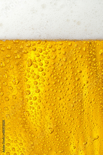 Beer. Light beer with bubbles and foam background