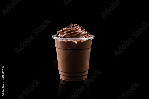 Chocolate milkshake in plastic takeaway cup isolated on black background