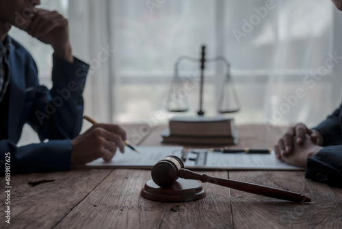 Team meeting at law firm, Business people discussion advisor concept, Non-reciprocal contract, Default, Earnest, Delict/tortious actions, Personally or Several liability, Defense of a prescription © Ratirath